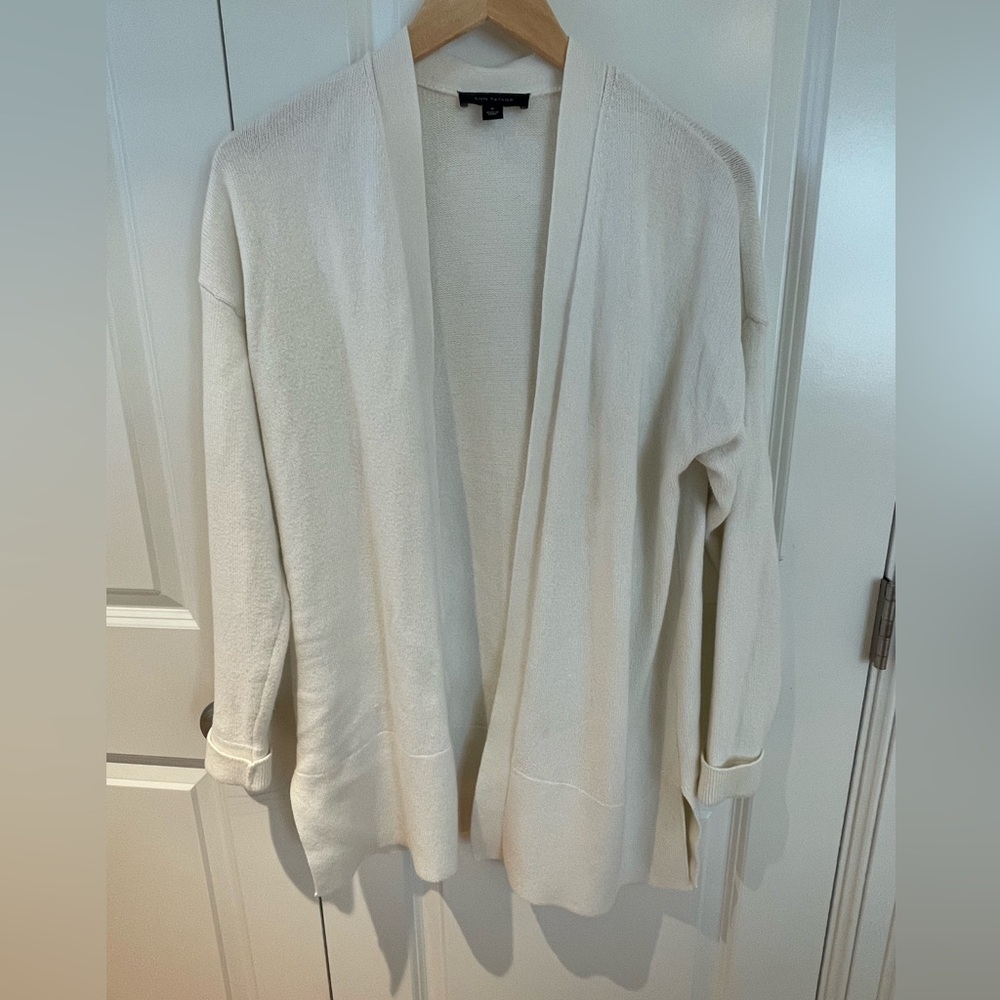 And Taylor cream open cardigan. Size medium.